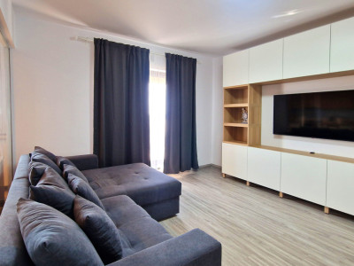 Apartament cu 2 camere de inchiriat -complet mobilat si utilat cu loc de parcare